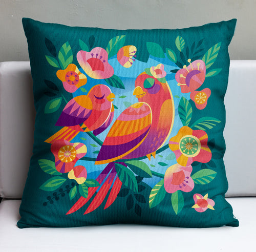 Jeff Granitos The Tweetest Mothers Day Pillow Cover features orange, pink, and purple birds nestled in vibrant yellow and pink flowers on a teal backdrop. Perfect for Mothers Day! U.S. shipping included with pre-order.