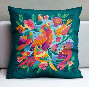 Jeff Granitos The Tweetest Mothers Day pillow cover features vibrant abstract birds and flowers on a teal background, enhancing the lively patterns. It is perfect for Mothers Day and rests elegantly on a white surface. Available for pre-order with U.S. shipping included.