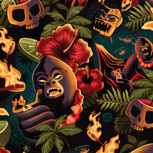 The Jeff Granitos Tiki Kong Modern Fit Button-Up Shirt features a vibrant design with a giant gorilla, tiki masks, skulls, tropical leaves, hibiscus flowers, and dramatic elements like flames around a helicopter and person in a boat. Available for unisex pre-order.